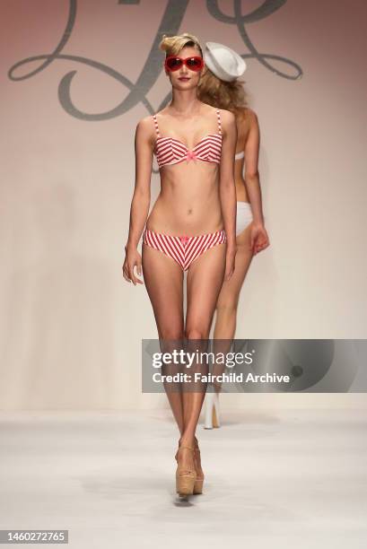 Model on the runway at Agent Provocateur's fall 2006 show at Smashbox Studios.