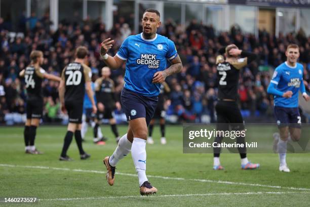 Jonson Clarke-Harris of Peterborough United celebrates after scoring the first goal during the Sky Bet League One between Peterborough United and...