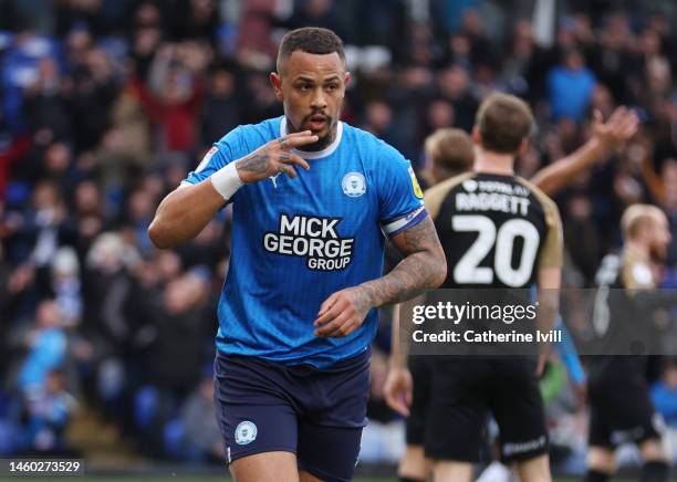 Jonson Clarke-Harris of Peterborough United celebrates after scoring the first goal during the Sky Bet League One between Peterborough United and...