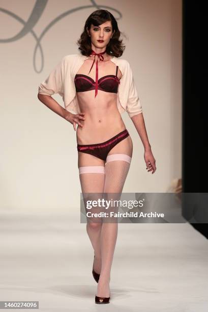 Model on the runway at Agent Provocateur's fall 2006 show at Smashbox Studios.