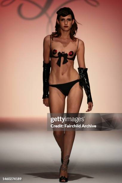 Model on the runway at Agent Provocateur's fall 2006 show at Smashbox Studios.