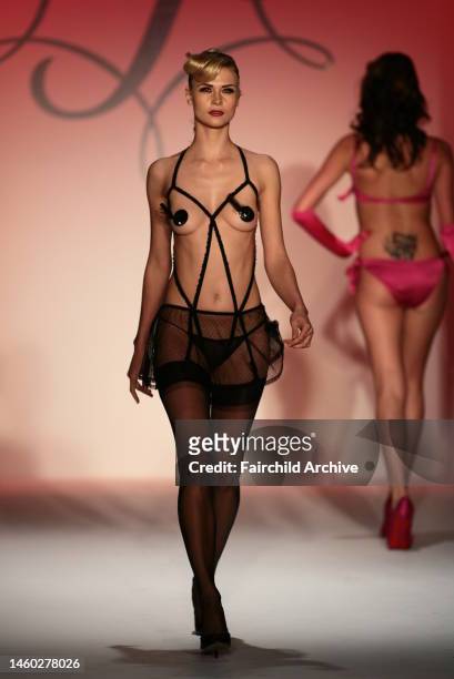 Model on the runway at Agent Provocateur's fall 2006 show at Smashbox Studios.