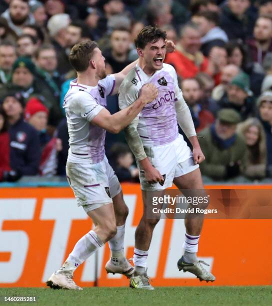 George Furbank Northampton Saints celebrates with team mate Rory Hutchinson after their victory during the Gallagher Premiership Rugby match between...