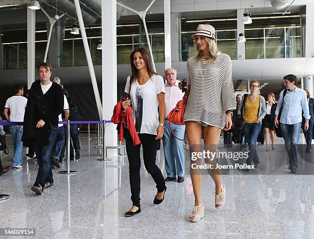 Lena Gercke , girlfriend of Sami Khedira and Silvia Meichel, girlfriend of Mario Gomez are seen at the airport Lviv on June 9, 2012 in L'viv, Ukraine.