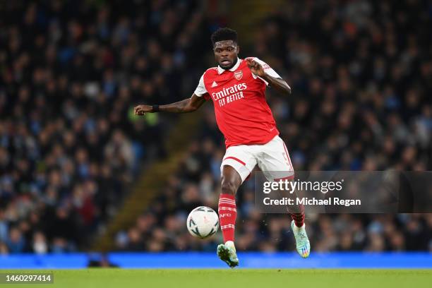 Thomas Partey of Arsenal in action during the Emirates FA Cup Fourth Round match at the Etihad Stadium on January 27, 2023 in Manchester, England.