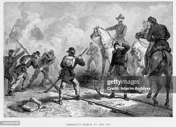 Illustration showing Union troops destroying railroad tracks during General William Tecumseh Sherman's march to the sea, Georgia, 1864.