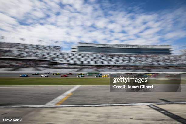 General view as cars race during the Rolex 24 at Daytona International Speedway on January 28, 2023 in Daytona Beach, Florida.