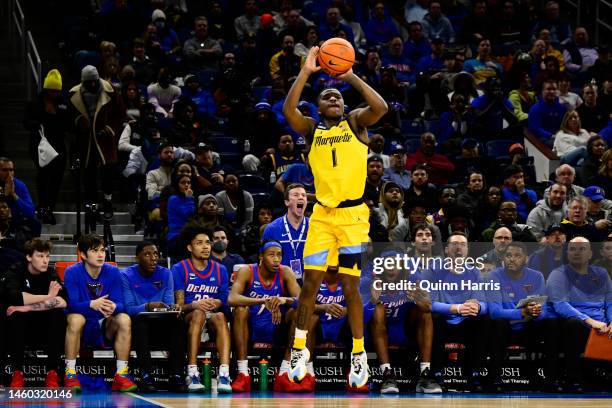 Kam Jones of the Marquette Golden Eagles shoots a 3-pointer in the first half in against the DePaul Blue Demons at Wintrust Arena on January 28, 2023...