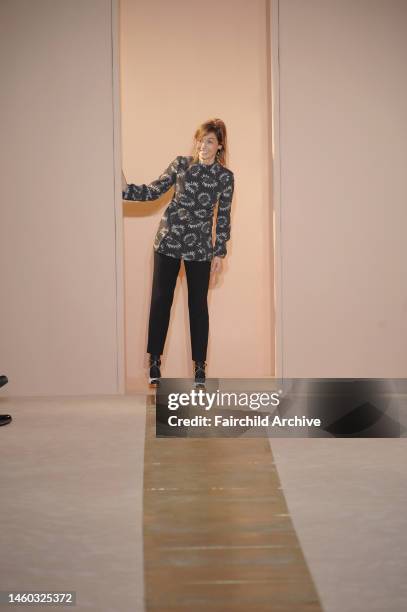 Designer Consuelo Castiglioni on the runway atfter her Marni fall 2012 show.