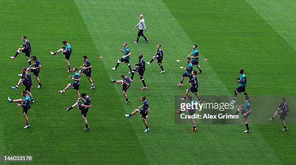 Players of Italy warm up during a UEFA EURO 2012 training session ahead of their Group C match against Spain at the Municipal Stadium on June 9, 2012...