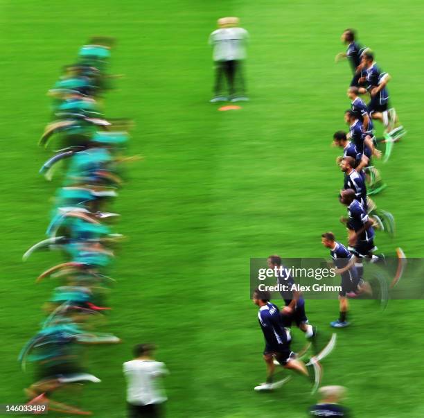 Players of Italy exercise during a UEFA EURO 2012 training session ahead of their Group C match against Spain at the Municipal Stadium on June 9,...