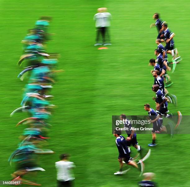 Players of Italy exercise during a UEFA EURO 2012 training session ahead of their Group C match against Spain at the Municipal Stadium on June 9,...