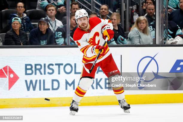 Rasmus Andersson of the Calgary Flames skates against the Seattle Kraken during the third period at Climate Pledge Arena on January 27, 2023 in...