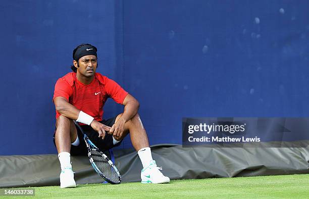 Leander Paes takes a break during a practice session ahead of the AEGON Championships at Queens Club on June 9, 2012 in London, England.