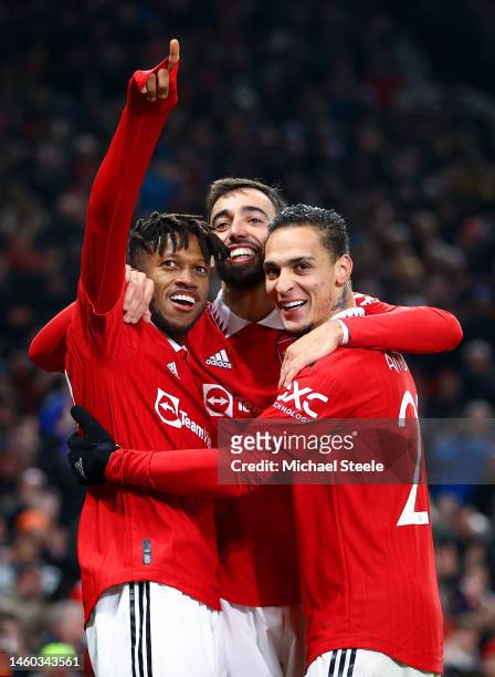 Fred of Manchester United celebrates after scoring the team's third goal with teammates Bruno Fernandes and Antony during the Emirates FA Cup Fourth...