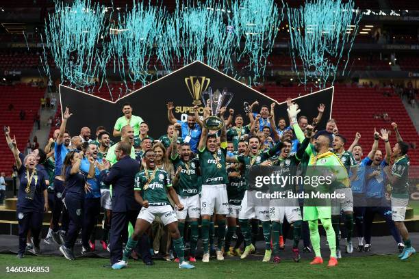 Gustavo Gomez of Palmeiras lifts the champions trophy after winning the Supercopa do Brasil 2023 final between Palmeiras and Flamengo at Mane...