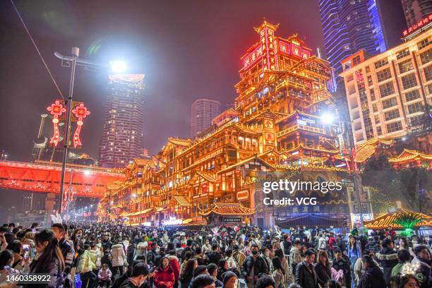 Tourists visit Hongya Cave during the Spring Festival holiday on January 26, 2023 in Chongqing, China.