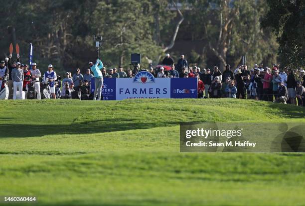 Max Homa of the United States plays his shot from the 15th tee during the final round of the Farmers Insurance Open on the South Course of Torrey...