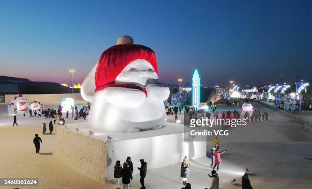 Rabbit-shaped snow sculpture wearing a red hat is seen at Harbin Ice and Snow World during the Spring Festival holiday on January 27, 2023 in Harbin,...