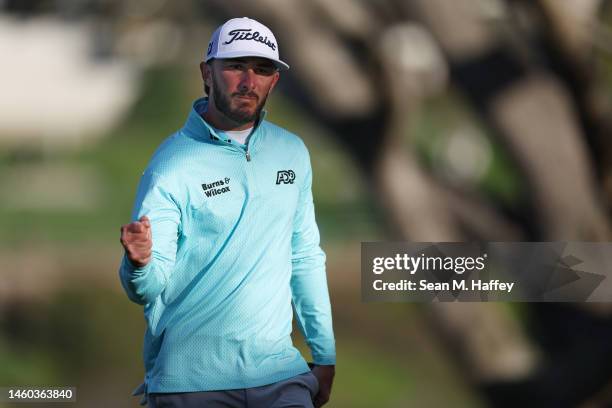 Max Homa of the United States reacts to his putt on the 16th green during the final round of the Farmers Insurance Open on the South Course of Torrey...