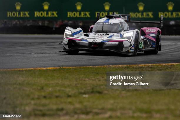 The Meyer Shank Racing w/ Curb-Agajanian Acura ARX-06 of Tom Blomqvist, Colin Braun, Helio Castroneves, and Simon Pagenaud drives during the Rolex 24...
