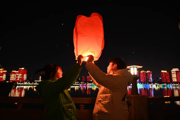 CHN: People Fly Kongming Lanterns In Xiangyang