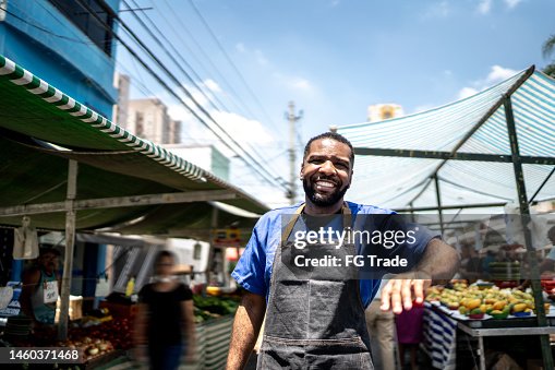 Portrait of a salesman on a street market Portrait of a salesman on a street market