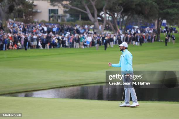 Max Homa of the United States reacts after a putt on the 18th green during the final round of the Farmers Insurance Open on the South Course of...