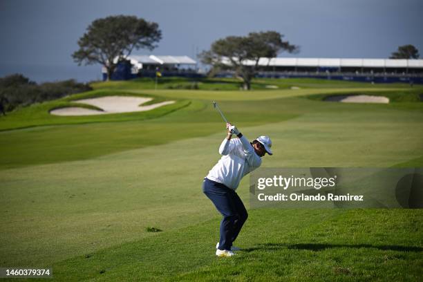 Hideki Matsuyama of Japan plays his shot on the 14th hole during the final round of the Farmers Insurance Open on the South Course of Torrey Pines...