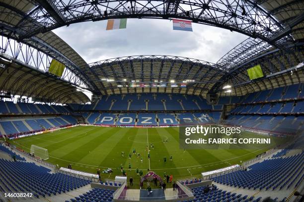 General view shows the Republic of Ireland's national football team taking part in a training session at the Municipal Stadium in Poznan on June 9 on...