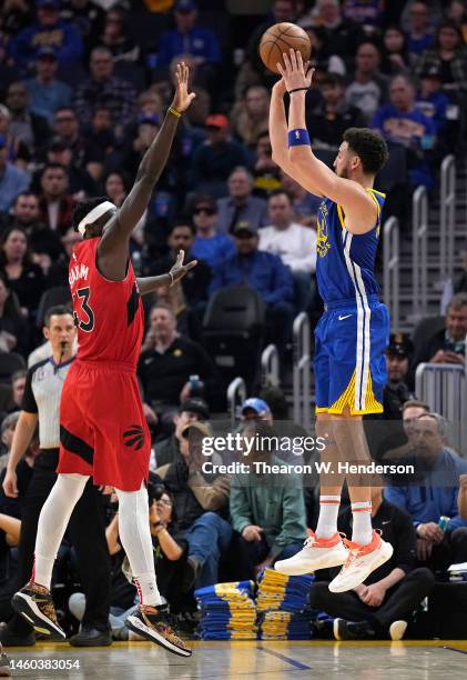 Klay Thompson of the Golden State Warriors shoots over Pascal Siakam of the Toronto Raptors during the first quarter of an NBA basketball game at...