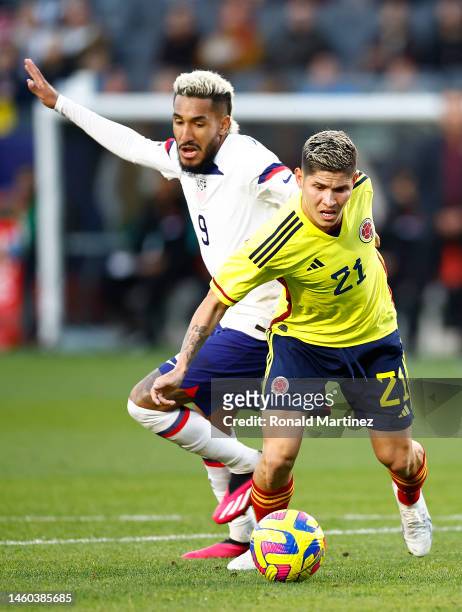 Jesus Ferreira of the United States collides with Jorman Campuzano of Colombia during the first half in the International Friendly match at Dignity...