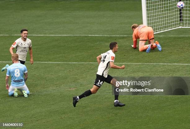 George Blackwood of Adelaide United celebrates after scoring a goal during the round 14 A-League Men's match between Melbourne City and Adelaide...