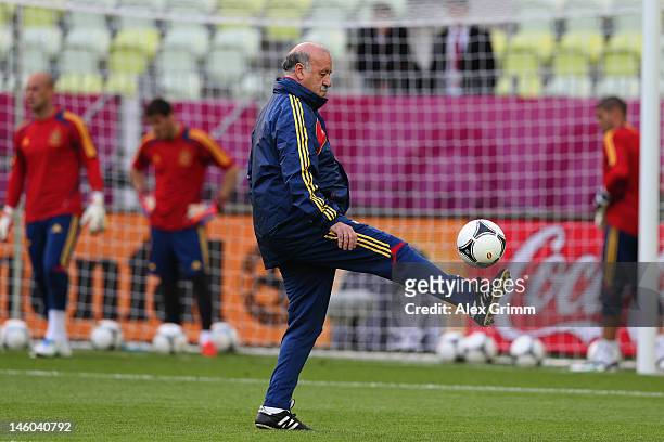 Head coach Vicente del Bosque of Spain juggles with the ball during a UEFA EURO 2012 training session ahead of their Group C match against Italy at...