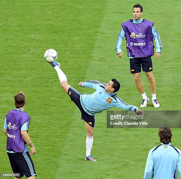 Xavi Hernandez of Spain during a training session ahead of the UEFA EURO 2012 Group C match against Italy at the Municipal Stadium on June 9, 2012 in...