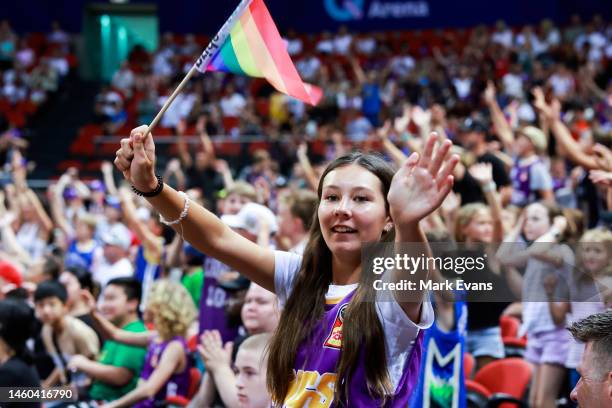 Girl waves a Pride flag during the round 17 NBL match between Sydney Kings and South East Melbourne Phoenix at Qudos Bank Arena, on January 29 in...