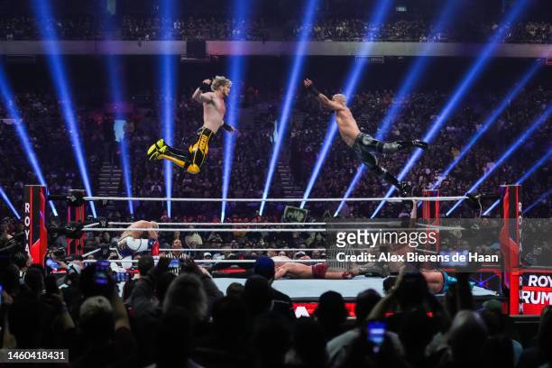 Logan Paul and Ricochet wrestle during the WWE Royal Rumble at the Alamodome on January 28, 2023 in San Antonio, Texas.
