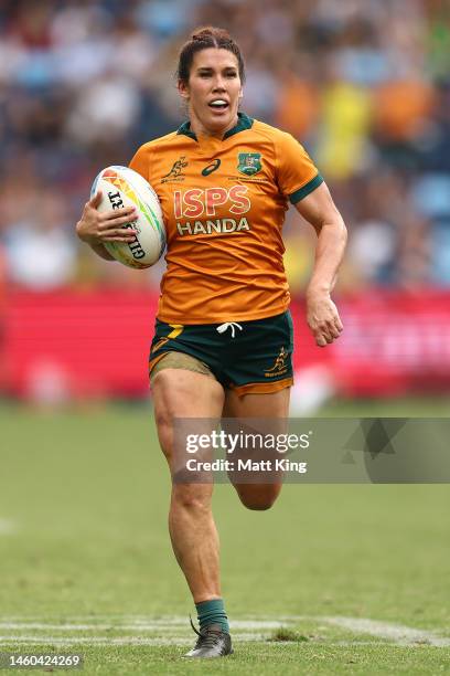 Charlotte Caslick of Australia runs with the during the 2023 Sydney Sevens match between Australia and Fiji at Allianz Stadium on January 29, 2023 in...