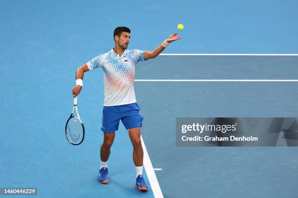 Novak Djokovic of Serbia serves in the Men’s Singles Final against Stefanos Tsitsipas of Greece during day 14 of the 2023 Australian Open at...