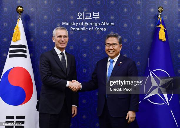 Secretary General Jens Stoltenberg shakes hands with South Korean Foreign Minister Park Jin during their meeting at the Foreign Ministry on January...