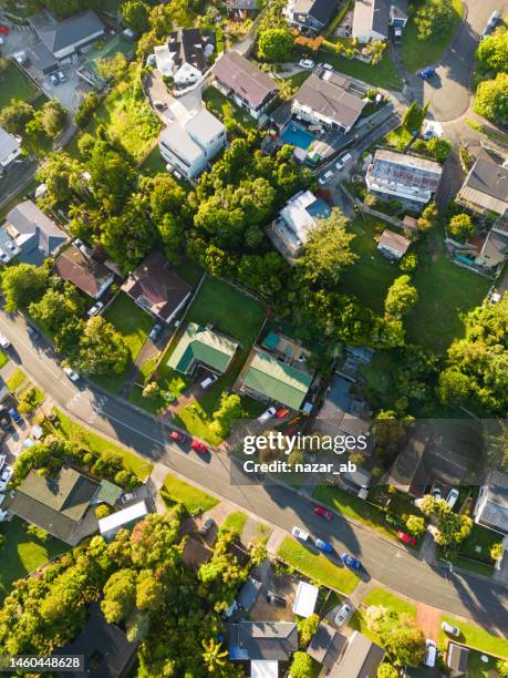 aerial view of suburban houses in a country town. - suburban community stock pictures, royalty-free photos & images