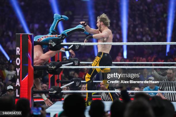 Logan Paul throws Seth Rollins out of the ring during the WWE Royal Rumble at the Alamodome on January 28, 2023 in San Antonio, Texas.