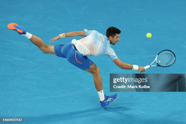 Novak Djokovic of Serbia plays a backhand in the Men’s Singles Final against Stefanos Tsitsipas of Greece during day 14 of the 2023 Australian Open...