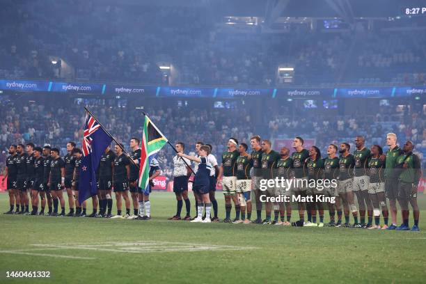 The teams sing the national anthem before the 2023 Sydney Sevens match between New Zealand and South Africa at Allianz Stadium on January 29, 2023 in...