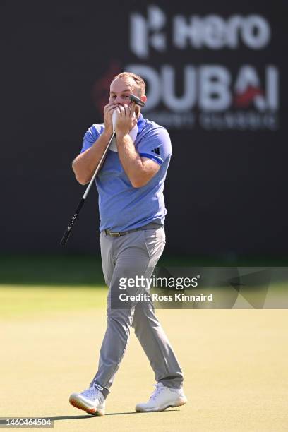 Tyrell Hatton of England reacts on the 18th green during the Third Round on Day Four of the Hero Dubai Desert Classic at Emirates Golf Club on...