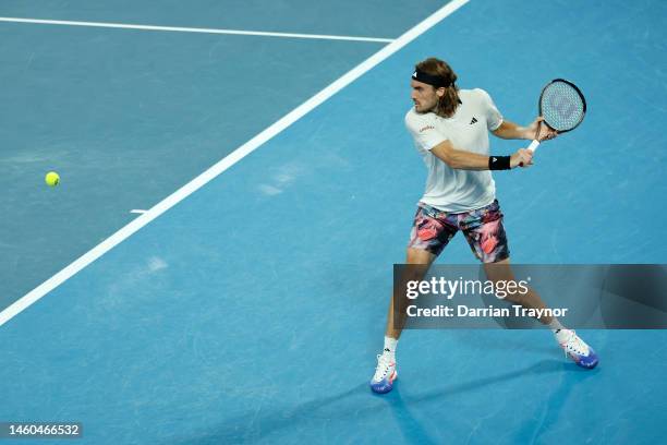 Stefanos Tsitsipas of Greece plays a backhand in the Men’s Singles Final against Novak Djokovic of Serbia during day 14 of the 2023 Australian Open...