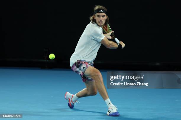 Stefanos Tsitsipas of Greece plays a backhand in the Men’s Singles Final against Novak Djokovic of Serbia during day 14 of the 2023 Australian Open...