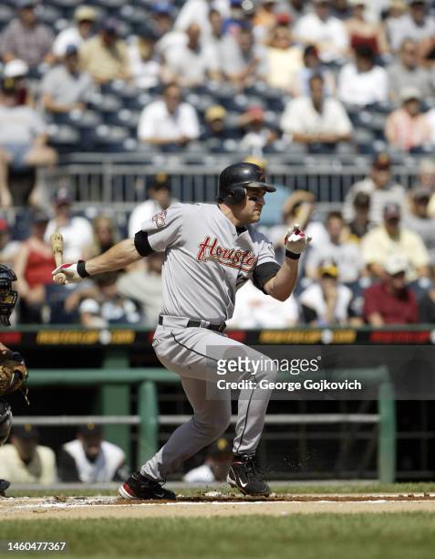 Lance Berkman of the Houston Astros bats against the Pittsburgh Pirates during a game at PNC Park on September 11, 2004 in Pittsburgh, Pennsylvania....