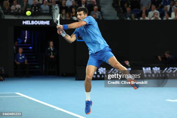 Novak Djokovic of Serbia plays a backhand in the Men’s Singles Final against Stefanos Tsitsipas of Greece during day 14 of the 2023 Australian Open...