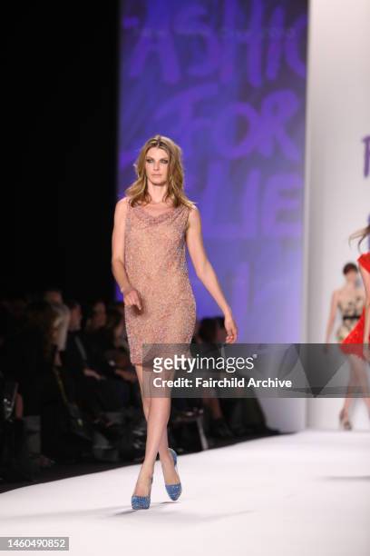 Model Angela Lindvall on the runway at Fashion For Relief's Haiti benefit show at Bryant Park's Tent.
